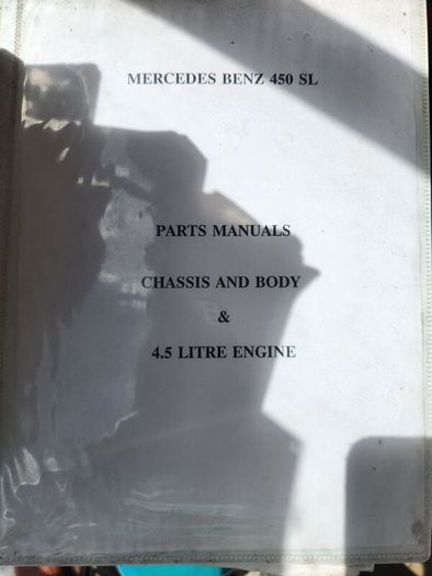 Mercedes service and parts R107. Also photo 4 another 450 sl hardback manual.