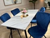 marble look dining table with chairs on special offer