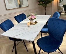 marble look dining table with chairs on special offer