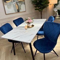 marble look dining table with chairs on special offer