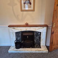 Marble fireplace surround & wooden mantel