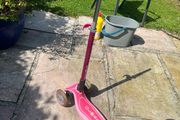 3 wheel children's light up scooter, one handle bar grip missing.