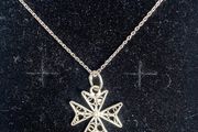 Weblike ornamental Silver cross like pendant on 925 chain