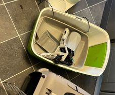 cat cage, litter box, liter scoop, drinking fountain