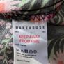 New. Warehouse Size 8 Black Floral print dress with frill trim. Image 6