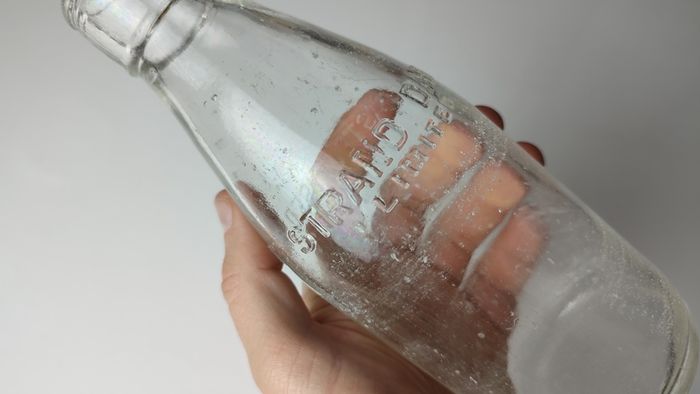 361 - Strand Dairy Vintage Collectible Decorative Clear Glass Embossed Letters Milk Bottle