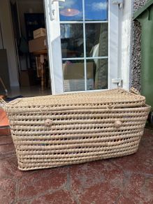 Palm leaf toy chest and babydoll bed