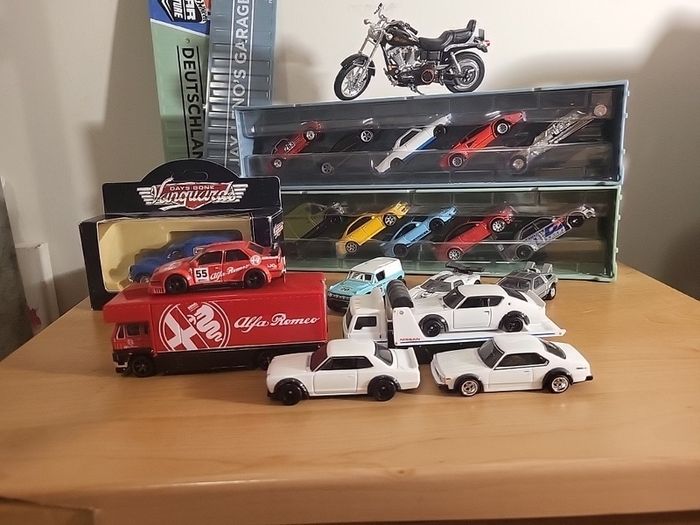 Assortment of diecast, primarily hot wheels premium, but includes a bike and lledo