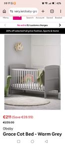 Grey cot bed