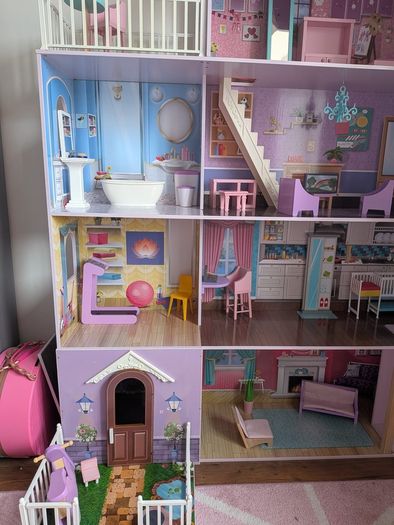 Large wooden dolls house with furniture