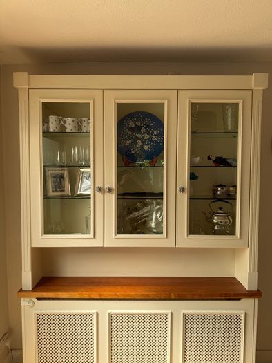 Radiator cover and display unit