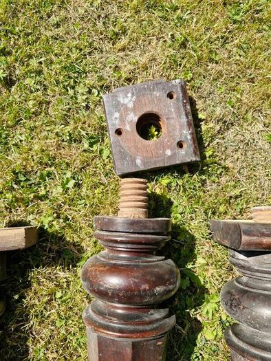 Antique mahogany piano legs with bronze casters