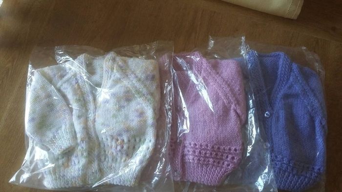 Beautiful hand knitted baby cardigans