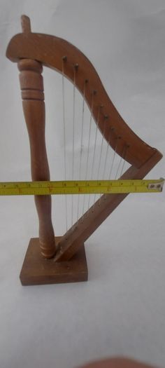 handcrafted wooden display harp ,,lovely display item for any man cave pub restaurant etc etc etc, buyer collects or pays postage.