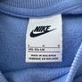 Purple Nike jumper. Image 3