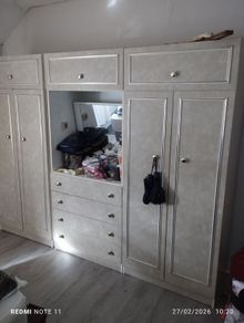 Three piece bedroom unit consisting of two Double bedroom wardrobes with 4 drawer dressing table with swivel mirror