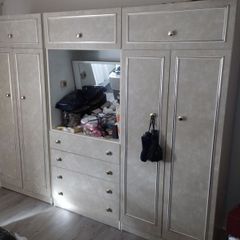 Three piece bedroom unit consisting of two Double bedroom wardrobes with 4 drawer dressing table with swivel mirror