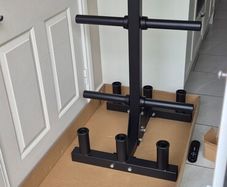 brand new olympic bar and plate storage rack