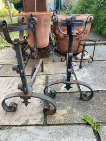 pair of cast iron fire place legs