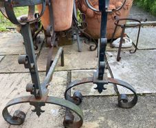 pair of cast iron fire place legs
