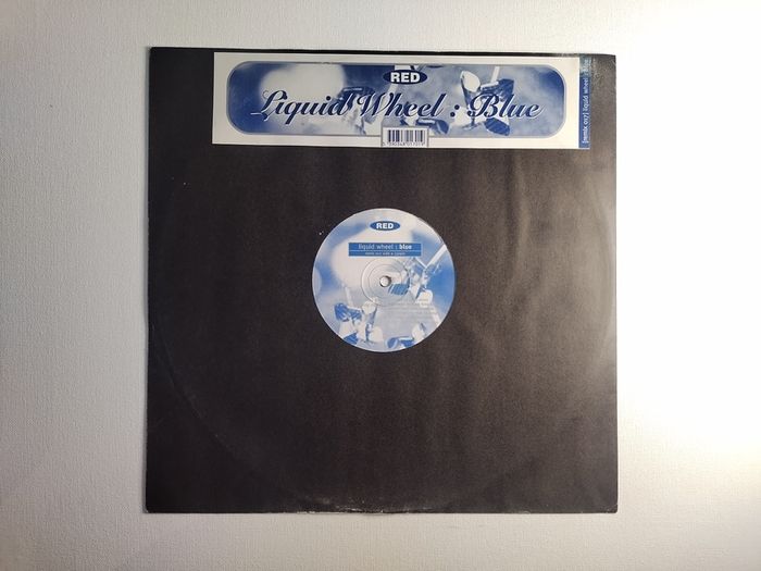 Liquid Wheel - Blue - Red Records - Oldskool Irish Trance BANGER from Liquid WHEEL! Condition: Excellent to Near MINT!