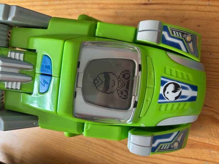 Two V-Tech Switch & Go Dinos