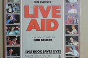 Live Aid book signed by Bob Geldof with proof
