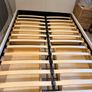 White faux leather 4ft 6in double bed frame, in as-new condition. Image 3