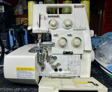 OVERLOCKER Sewing Machine - TOYOTA SL3335 - Just serviced - As new - All accessories included - Japanese quality made