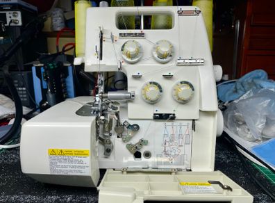 OVERLOCKER Sewing Machine - TOYOTA SL3335 - Just serviced - As new - All accessories included - Japanese quality made