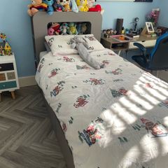 Wooden framed single bed
