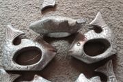 five cast metal napkin ring's
