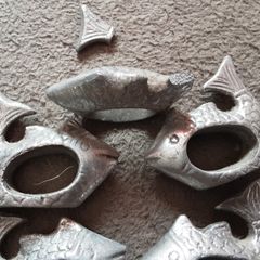 five cast metal napkin ring's
