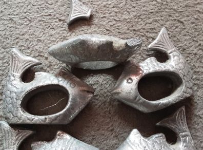 five cast metal napkin ring's