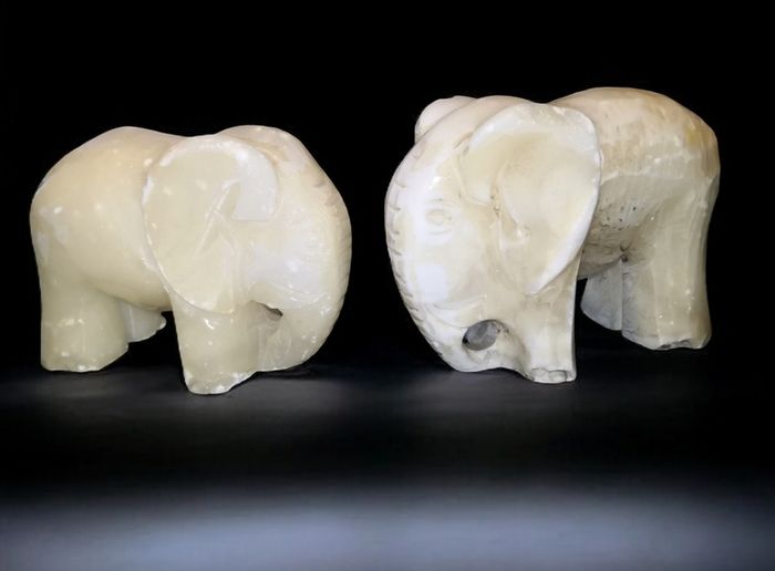 Pair of heavy white marble elephant bookends