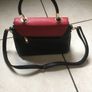 Beautiful handbag with a beautiful colour scheme of black, red and green with adjustable and removable shoulder strap Image 6