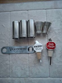 A Job Lot of Vintage 2x 1970's Bonzer 1/4 Gill Measurements  3x Bonzer 1/2 Gill Measurements  2 x Ceramic not plastic Paddy Irish WHISKEY & Cork DRY Gin Dispensers & 1 x  Metal Guinness Bottle Opener