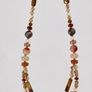 Handmade beaded necklace in warm amber, red and gold tones Image 2