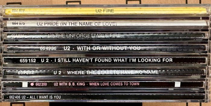 U2 cd singles x 8 ( 80's 84/89 )