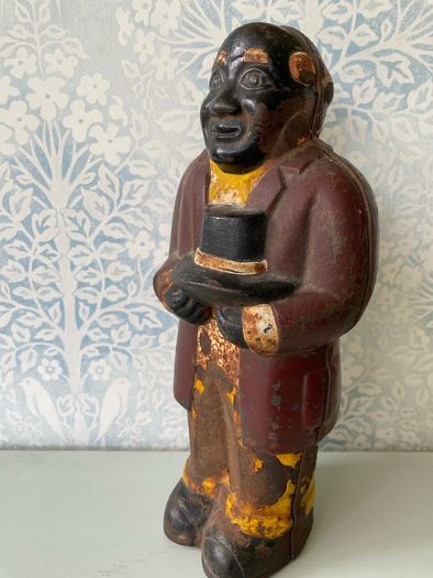 Original Cast Iron Uncle Moses Money box.