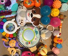 Selection of baby toys, sensory balls,