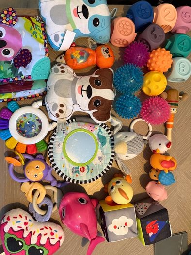 Selection of baby toys, sensory balls,