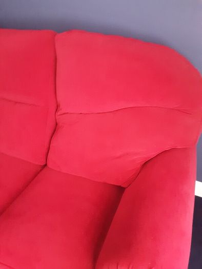 Large dark pink sofa immaculate condition size 80inchs long