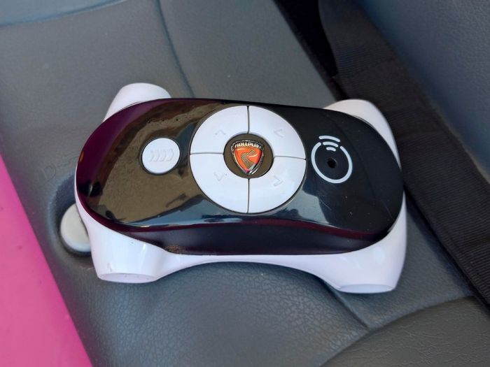 Kids Pink Electric Mini Cooper Car (used).