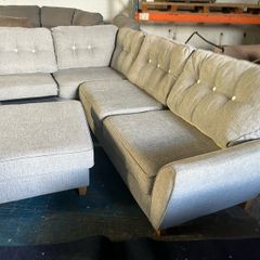 Grey corner sofa with matching footstool