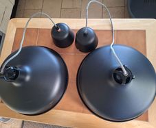 Two large industrial style pendant ceiling lights