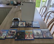 PS5 Disc Edition Bundle with 10 Games, Controller. In Excellent Condition