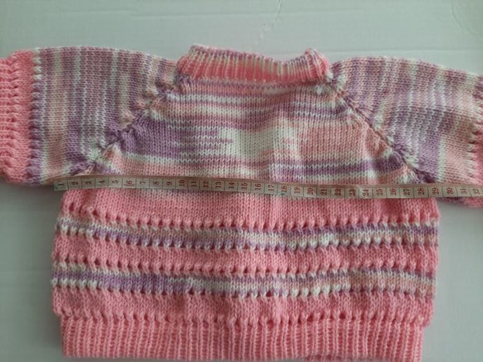 New childs pink short cardigan