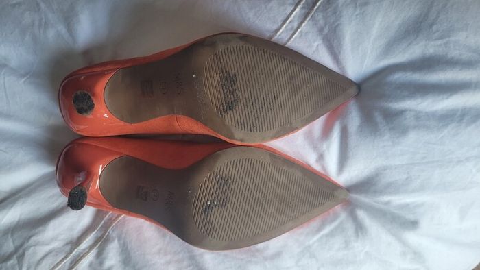 Matching orange shoes and bag