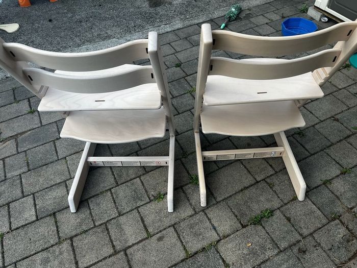 2 x Stokke Tripp Trapp Chairs and baby seat/harness